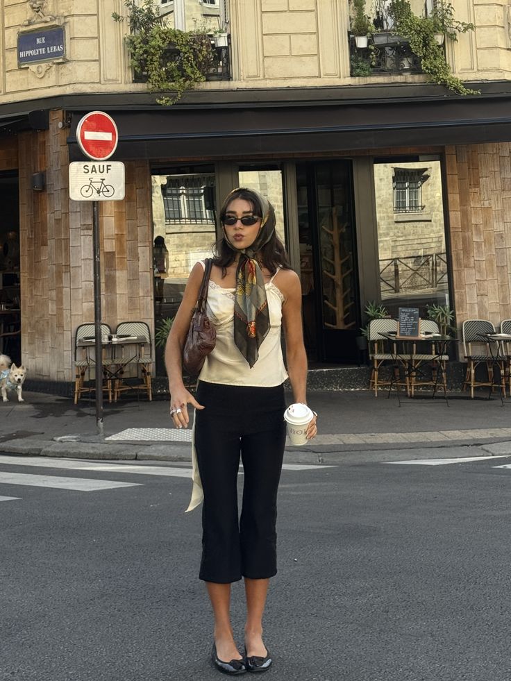 Silk camisole, headscarf and cropped black trousers on a Paris street corner